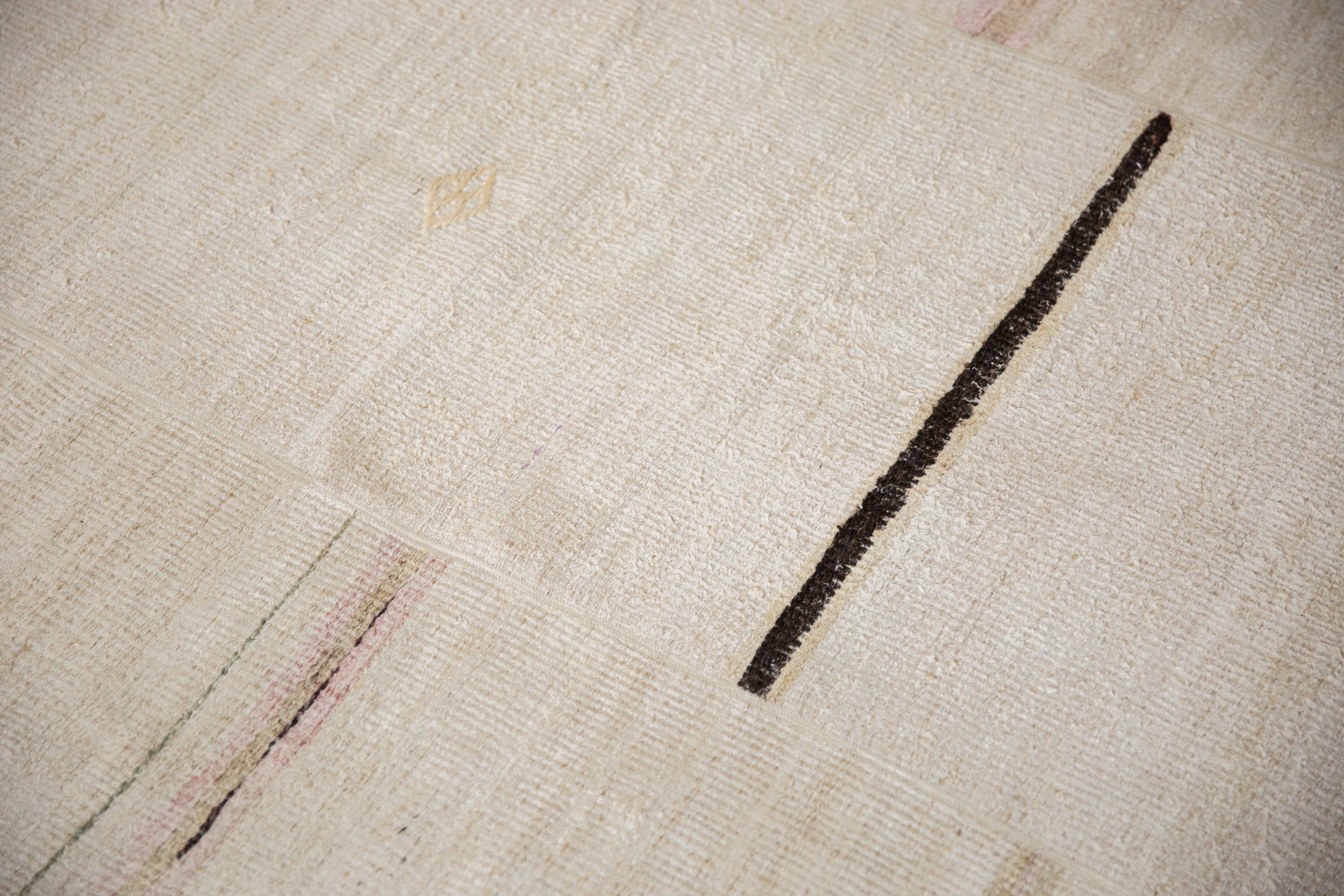 Back of the hand-knotted rug showing construction