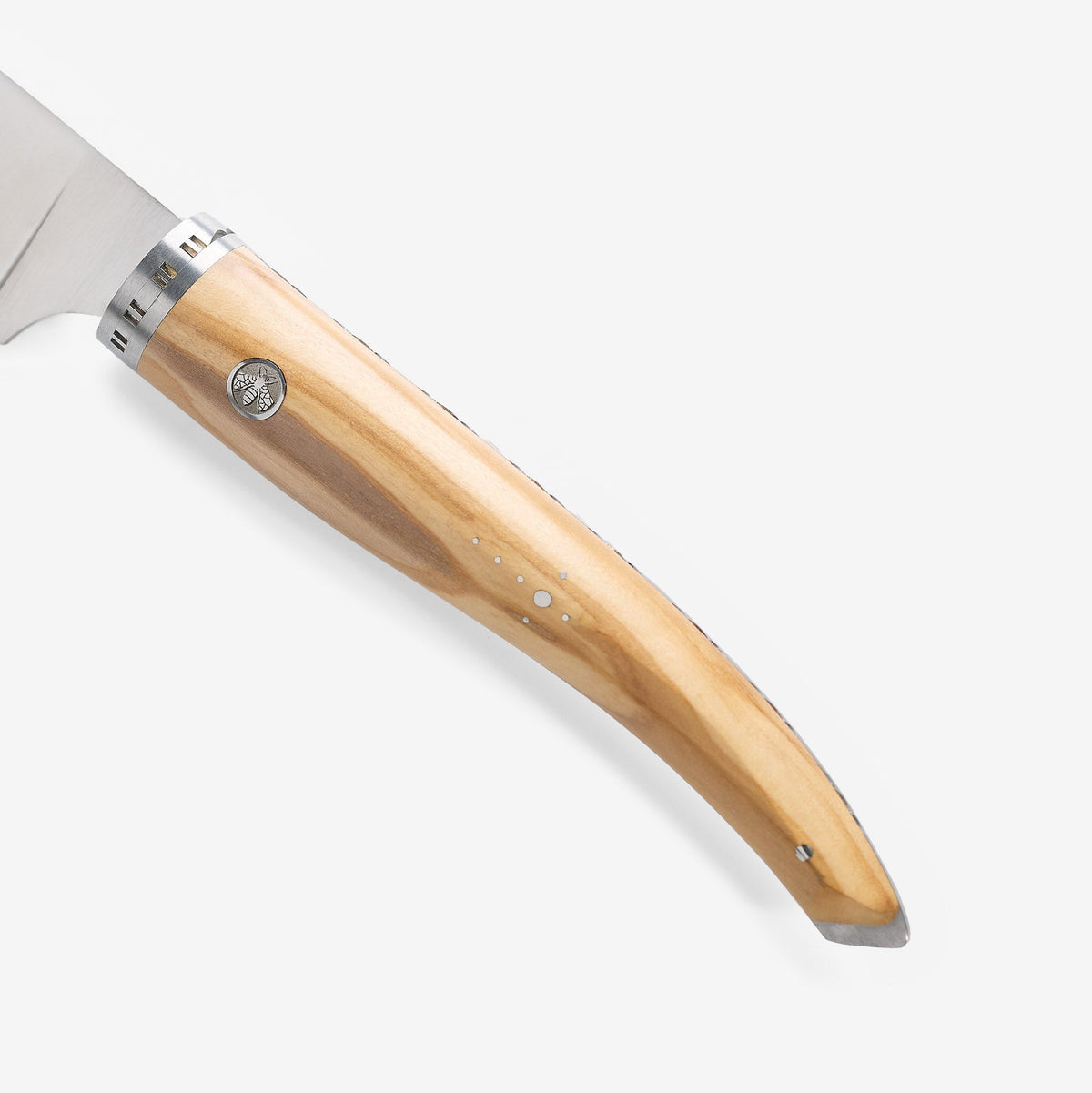 Close view of the olive wood grain and bolster