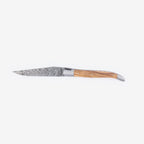Laguiole Balbach Damascus olive wood knife open on a pale background