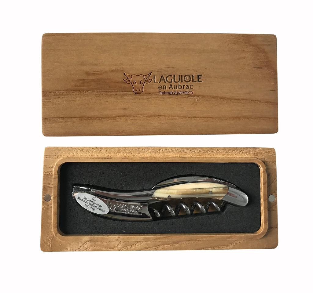 Corkscrew with cream and dark handle in an open French oak gift box