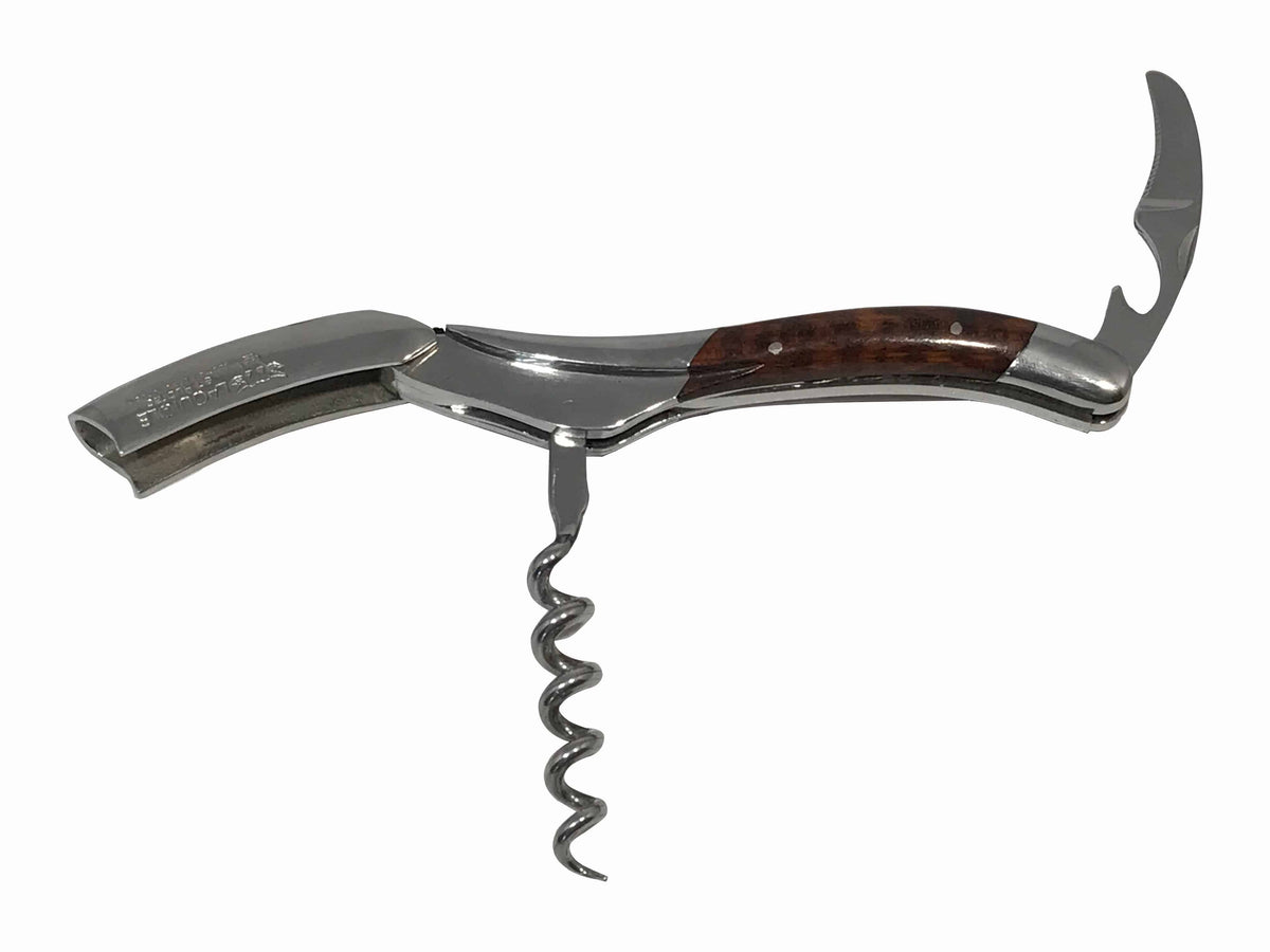 Opened corkscrew with the spiral down and foil cutter raised