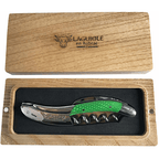 Green handled corkscrew in an open French oak gift box