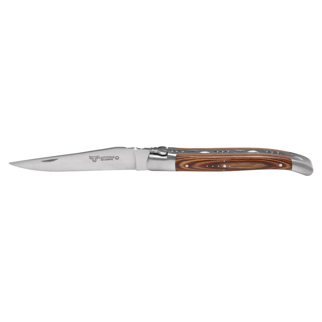 Steak knife with a warm brown layered pakkawood handle