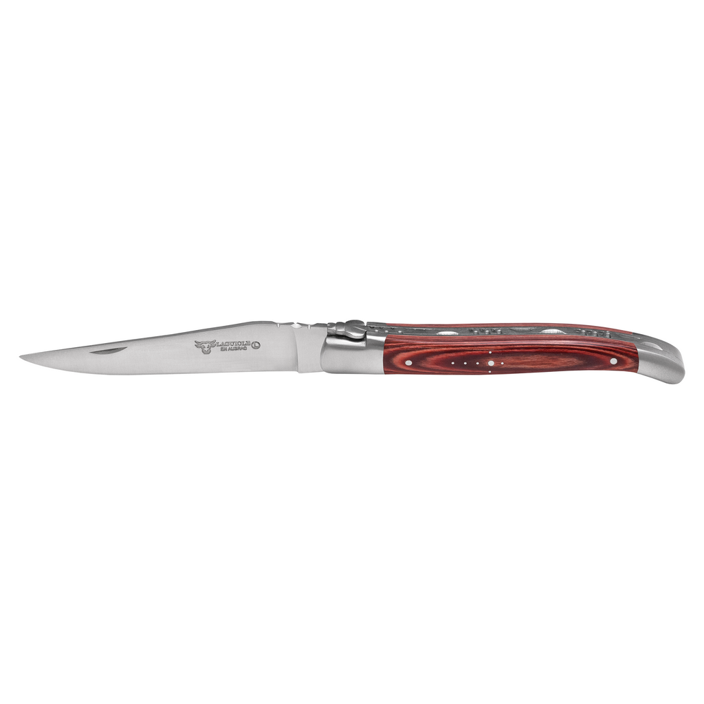 Steak knife with a red pakkawood handle