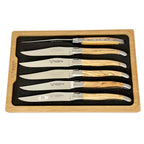 Six olive wood knives laid in the foam tray
