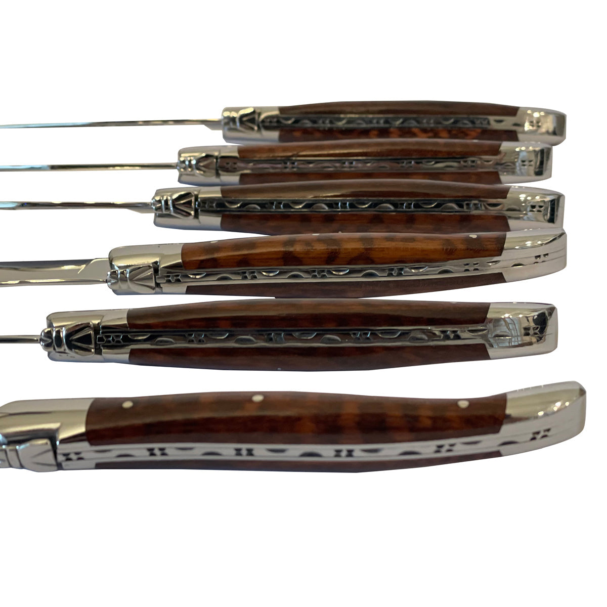 Close view of the carved spines and amourette handles