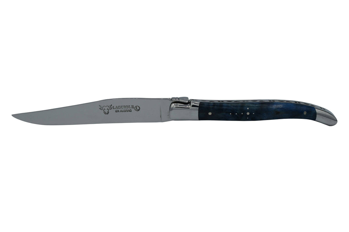 Single blue burl steak knife seen from the side