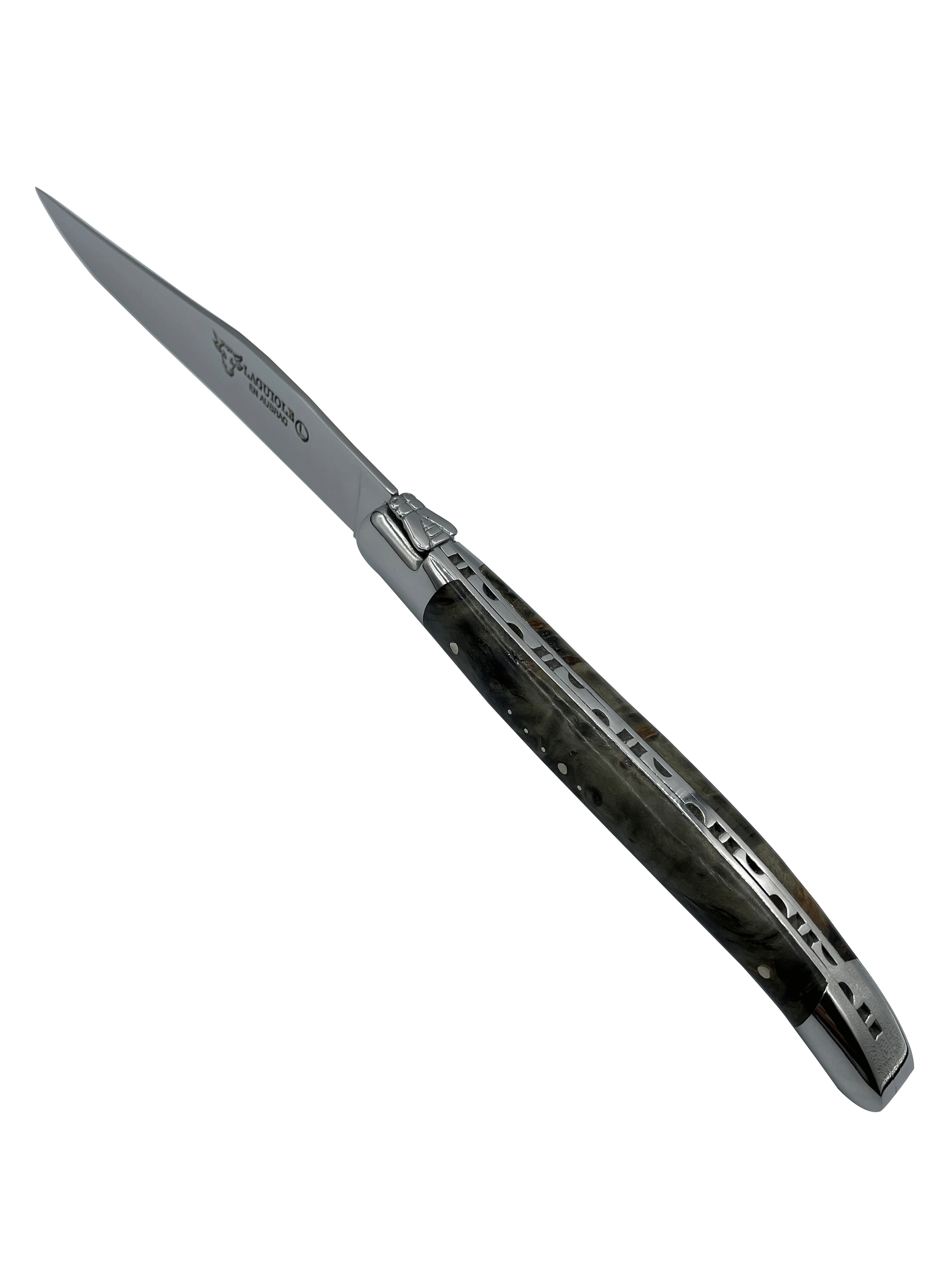 Single blackened burl steak knife at an angle