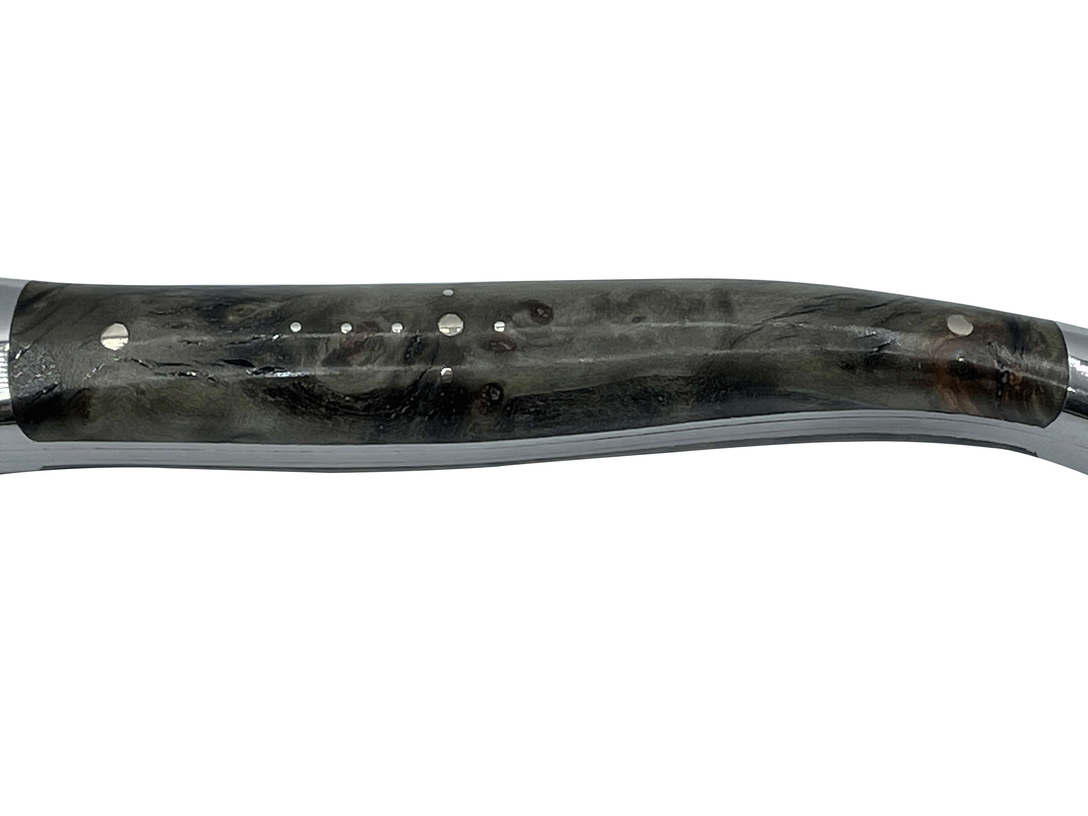 Close view of a charcoal burl handle with steel pins
