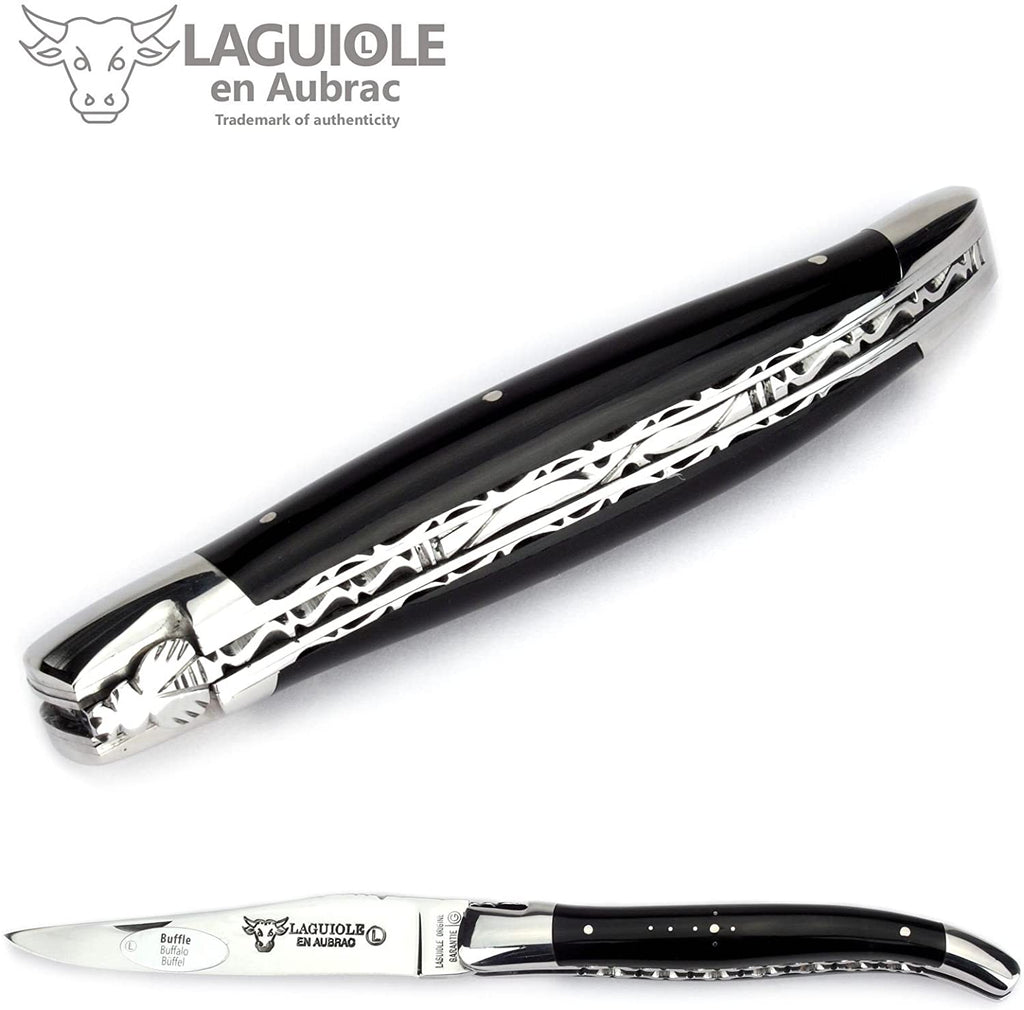 Closed knife at an angle showing the decorated back