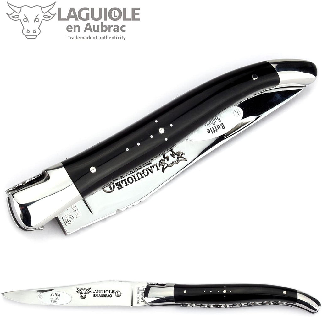 Half open knife showing the bolster and shepherd's cross