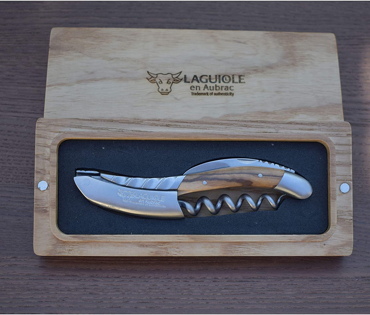 Olive wood corkscrew in an open oak gift box
