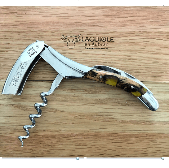 Corkscrew opened on the Laguiole en Aubrac oak lid with the spiral extended