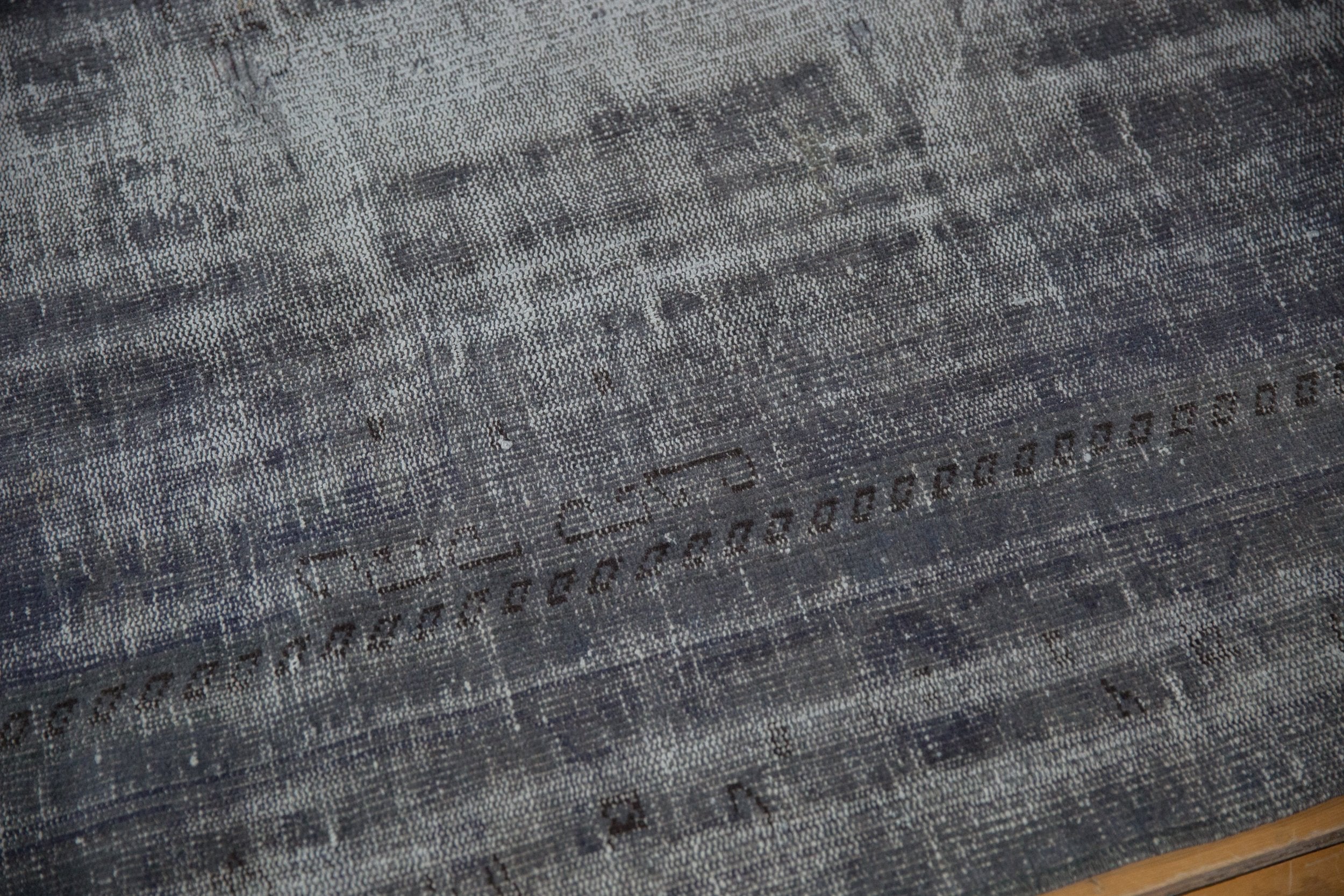 Back of the hand-knotted rug showing construction