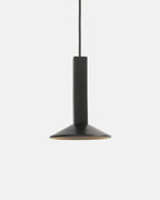small ceramic pendant light hanging above a kitchen counter