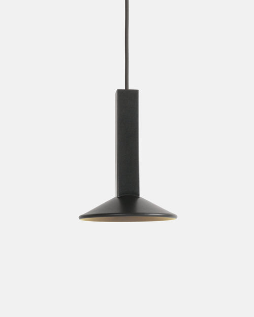 small ceramic pendant light hanging above a kitchen counter