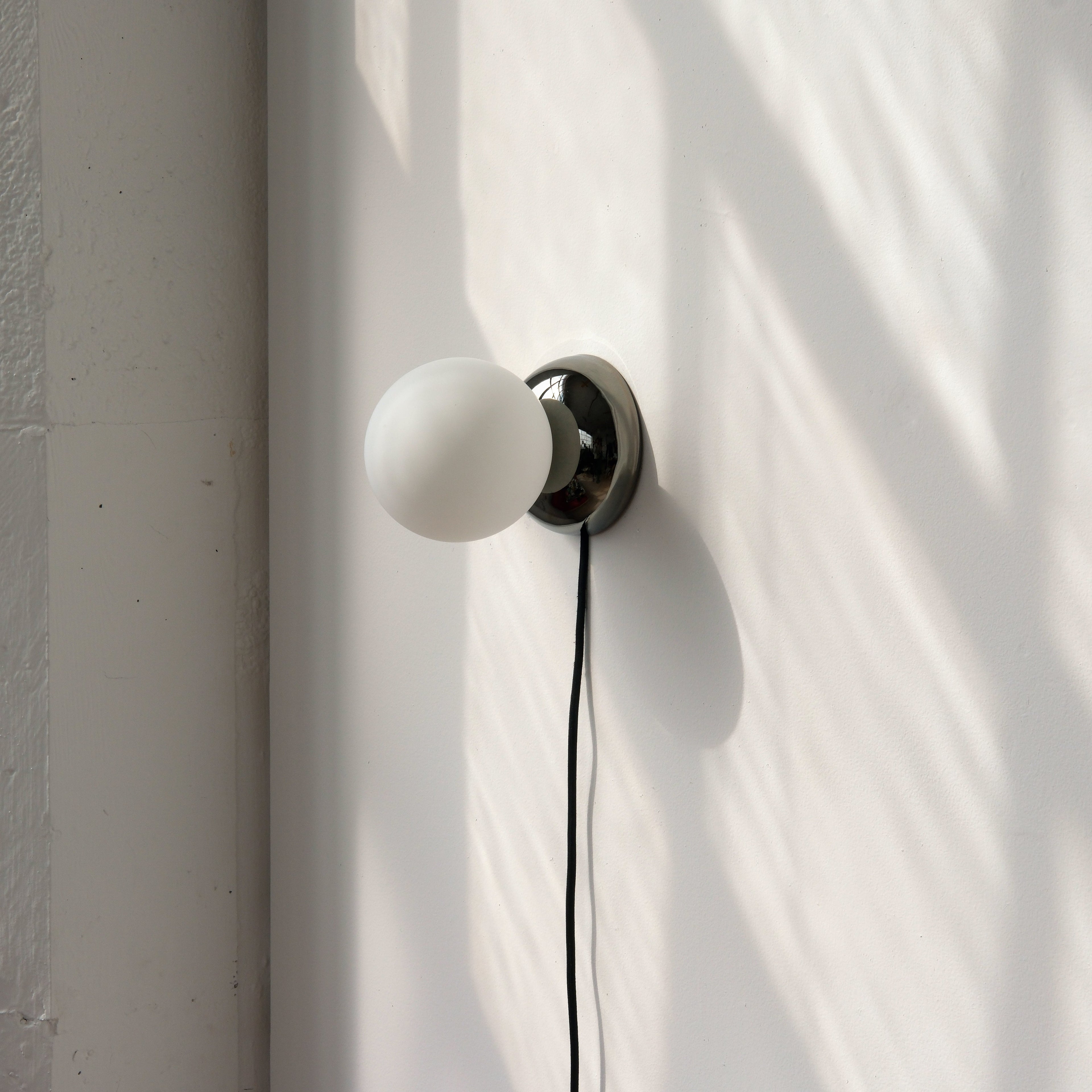 Ripple I Sconce chrome glaze detail with 4.7 inch globe