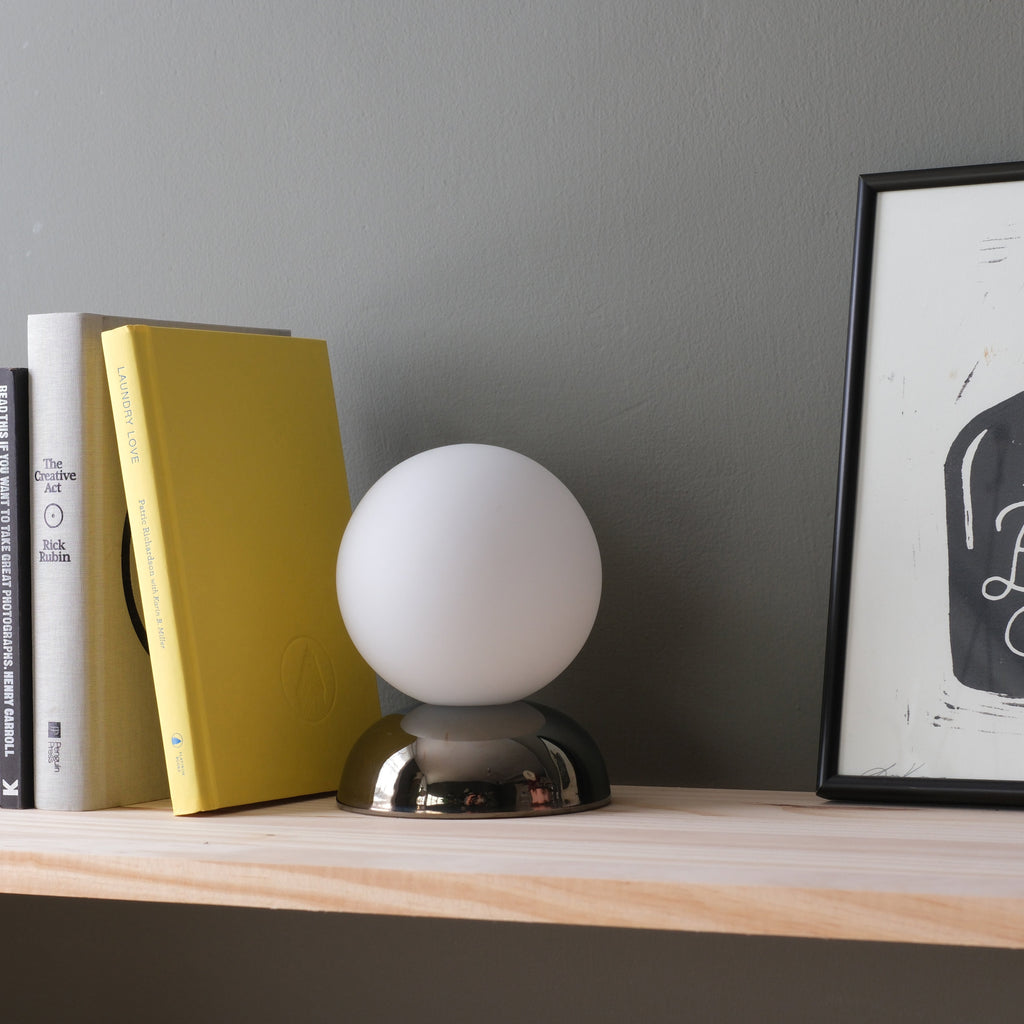 Ripple I Table Lamp showing ridged chrome ceramic body
