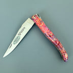 Knife half open with the blade pointing left
