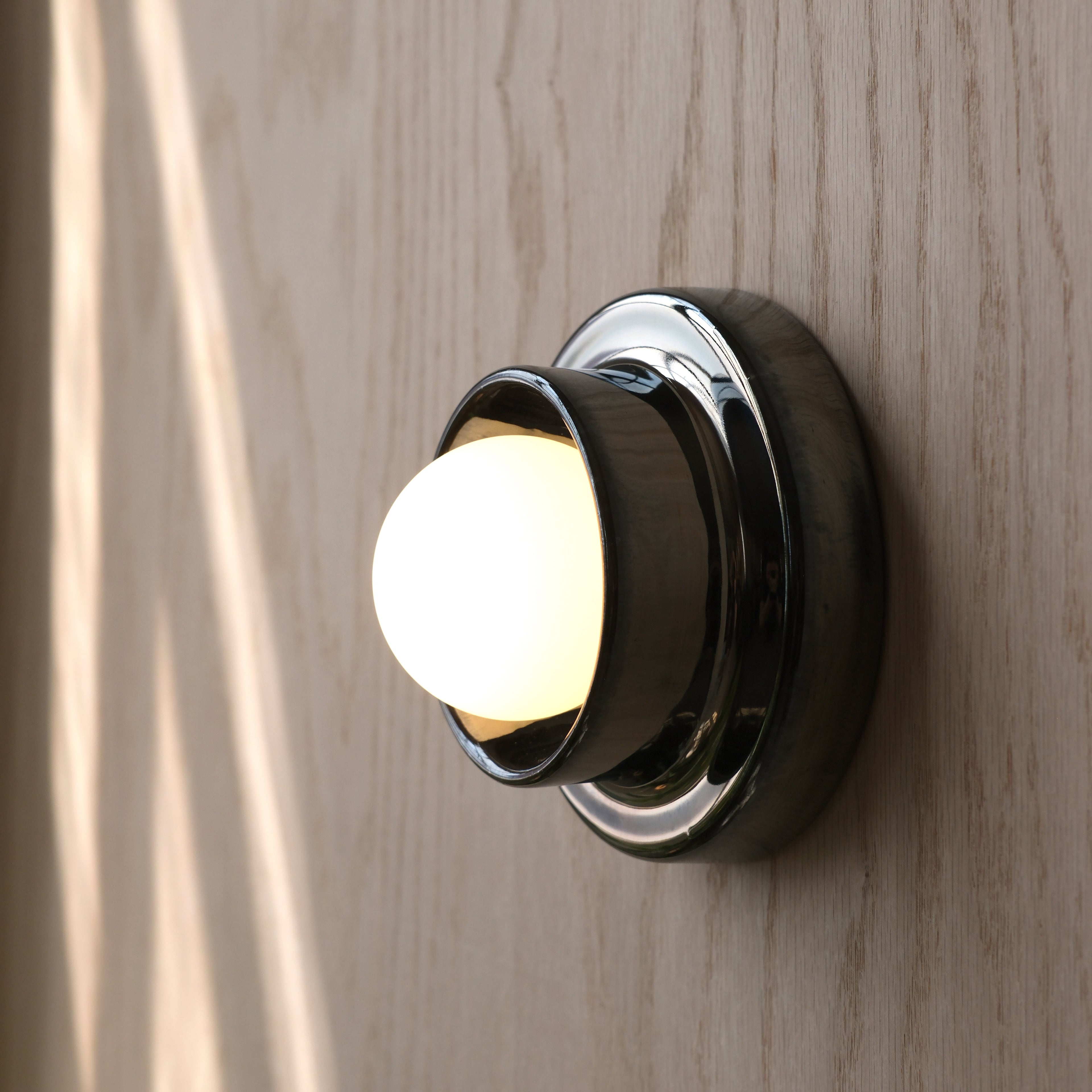 Q Sconce in Red glaze, ceramic body texture detail