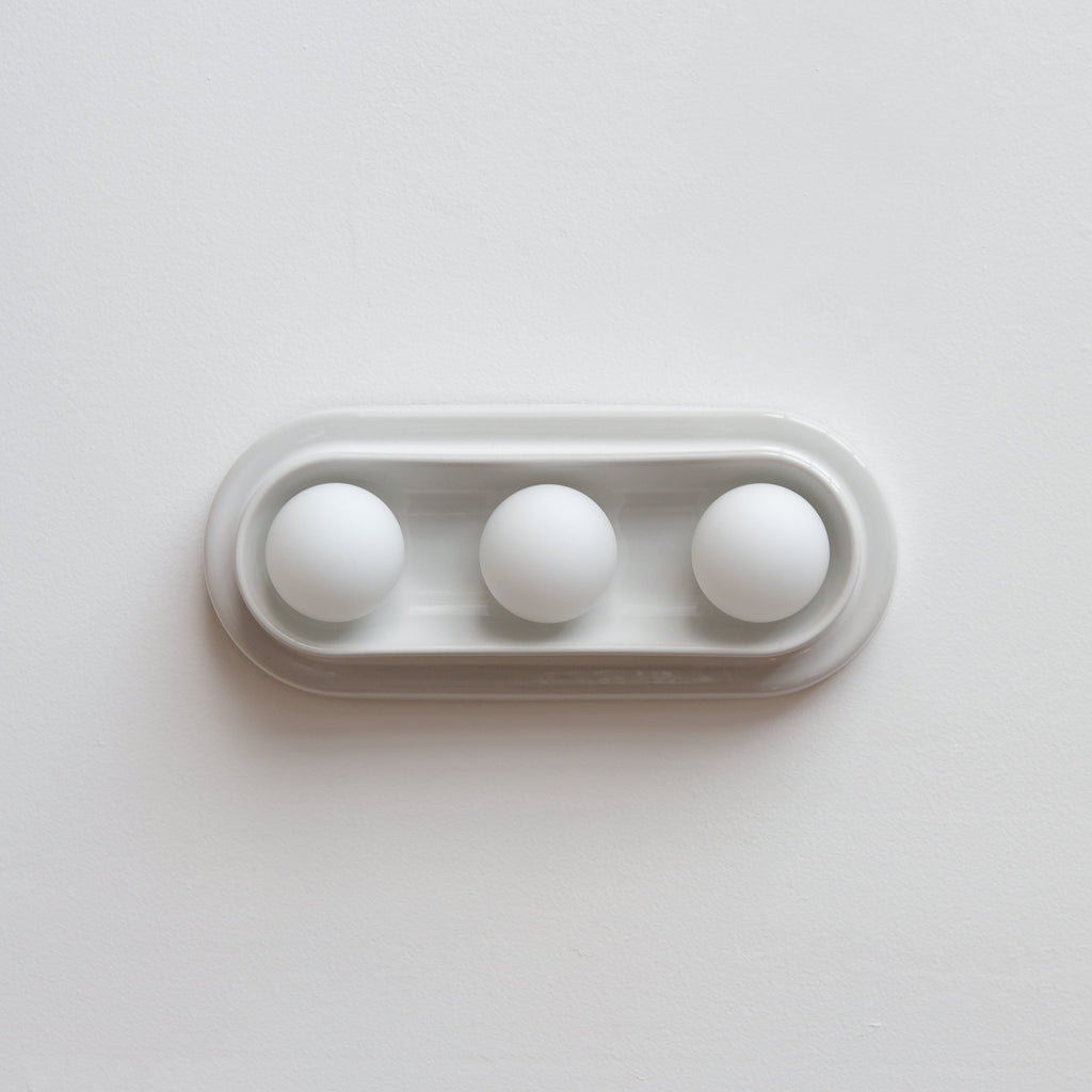 Q Triple Sconce scale against a 7-foot wall