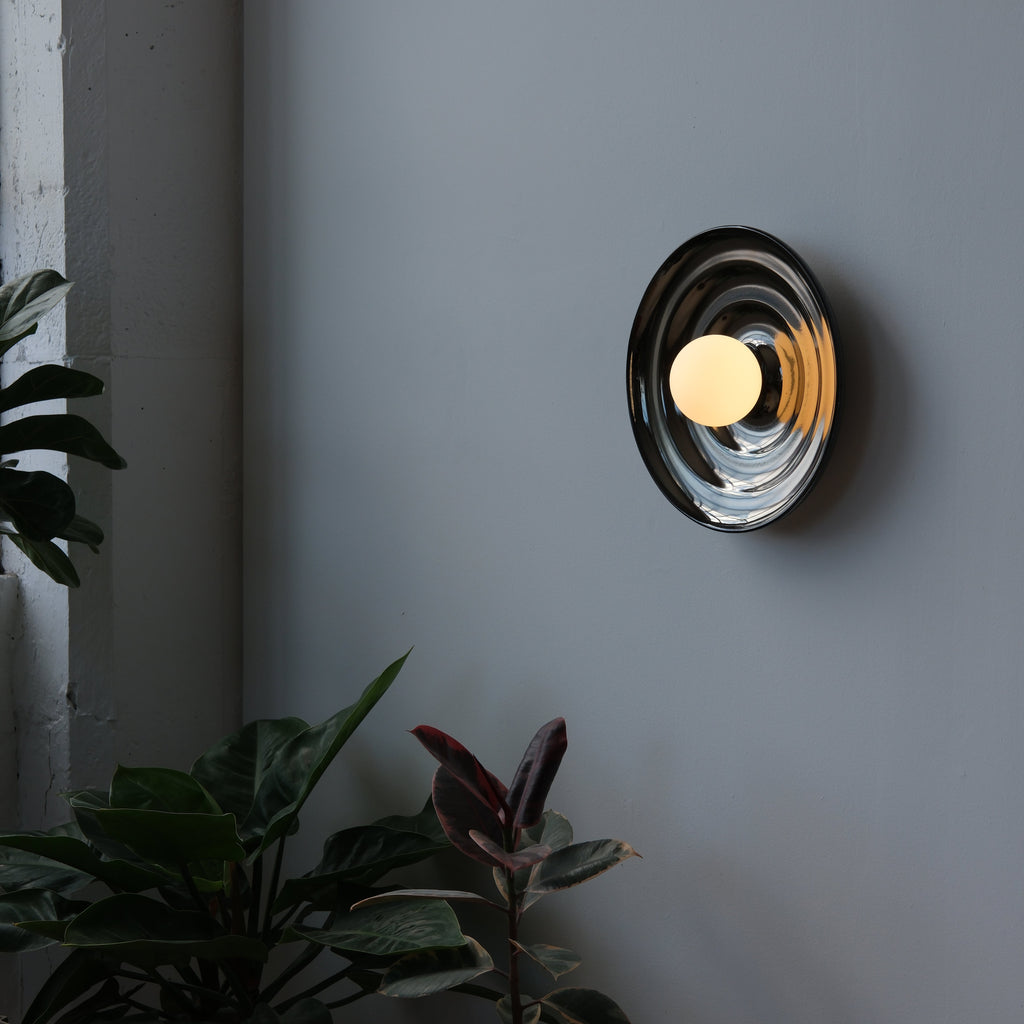 Ripple Bowl Sconce installed in a powder room