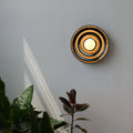 Ripple Bowl Sconce with rippled chrome ceramic surface