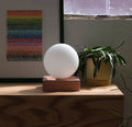 Cubic Table Lamp in White Glossy on a desk