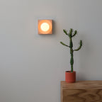 Cubic Sconce lit with G9 LED warm glow