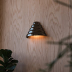 Ripple Conical Sconce showing tapered rippled form
