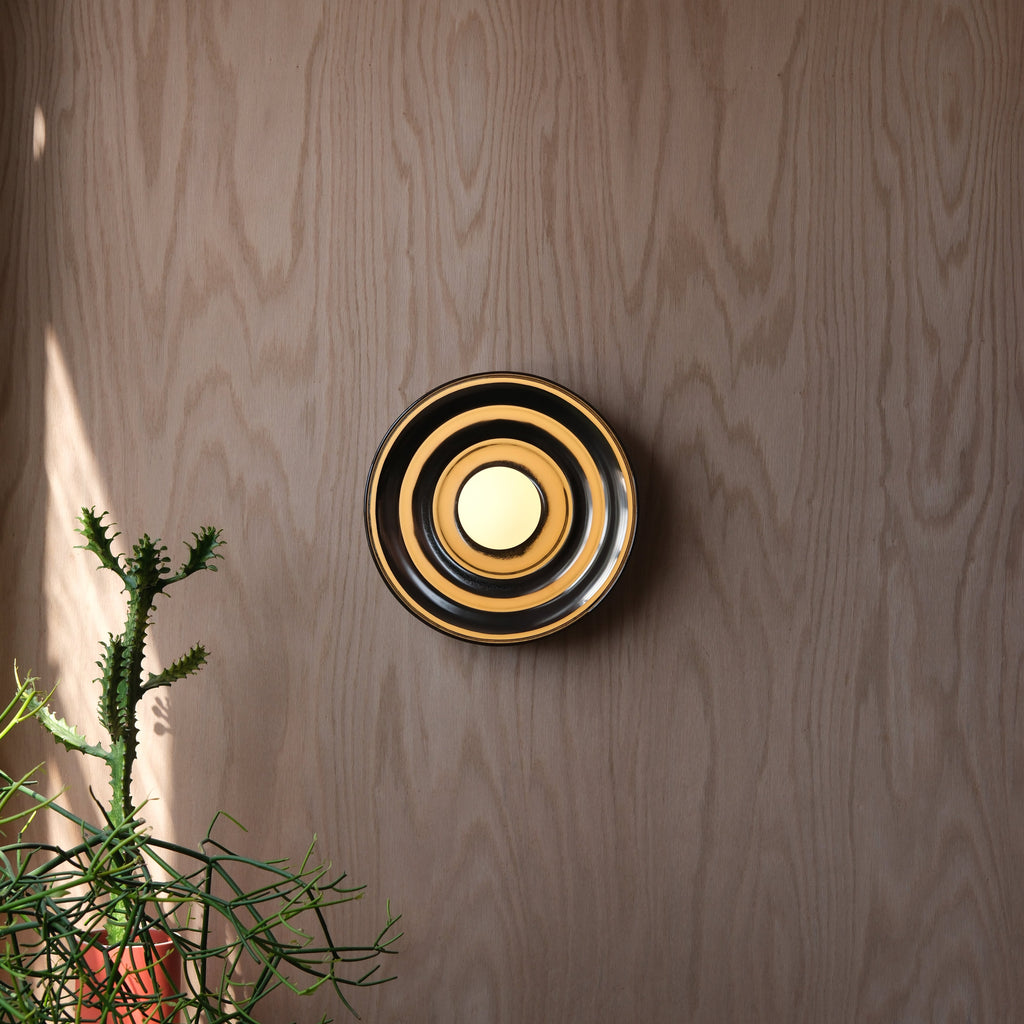 Ripple Bowl Sconce lit, back-wash light effect