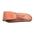 Laguiole brown leather knife sheath closed on a white background