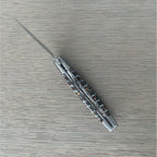 Open knife from the back, showing the double plates