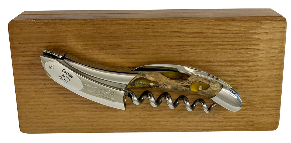Corkscrew resting on the closed oak gift box