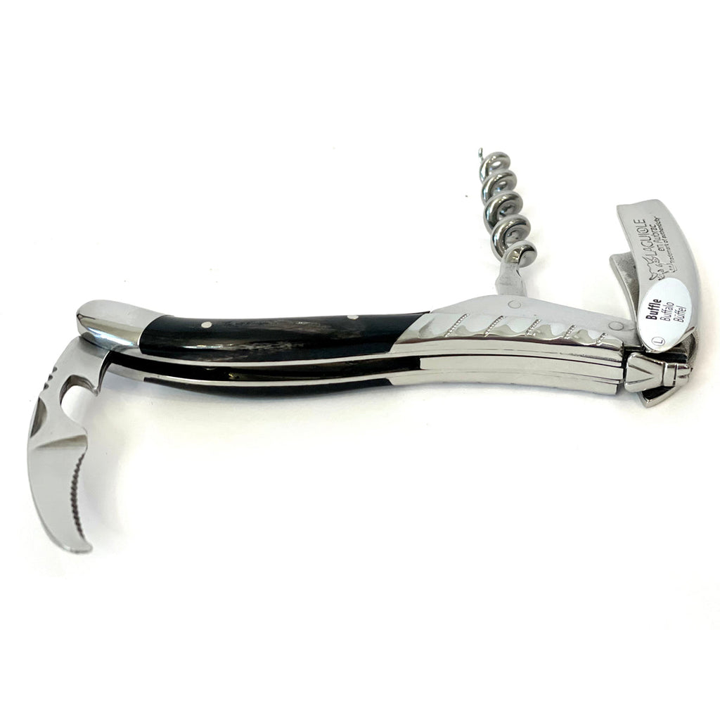 Corkscrew opened with the spiral up and foil cutter extended
