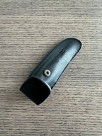Sheath turned to show the open top and rivet