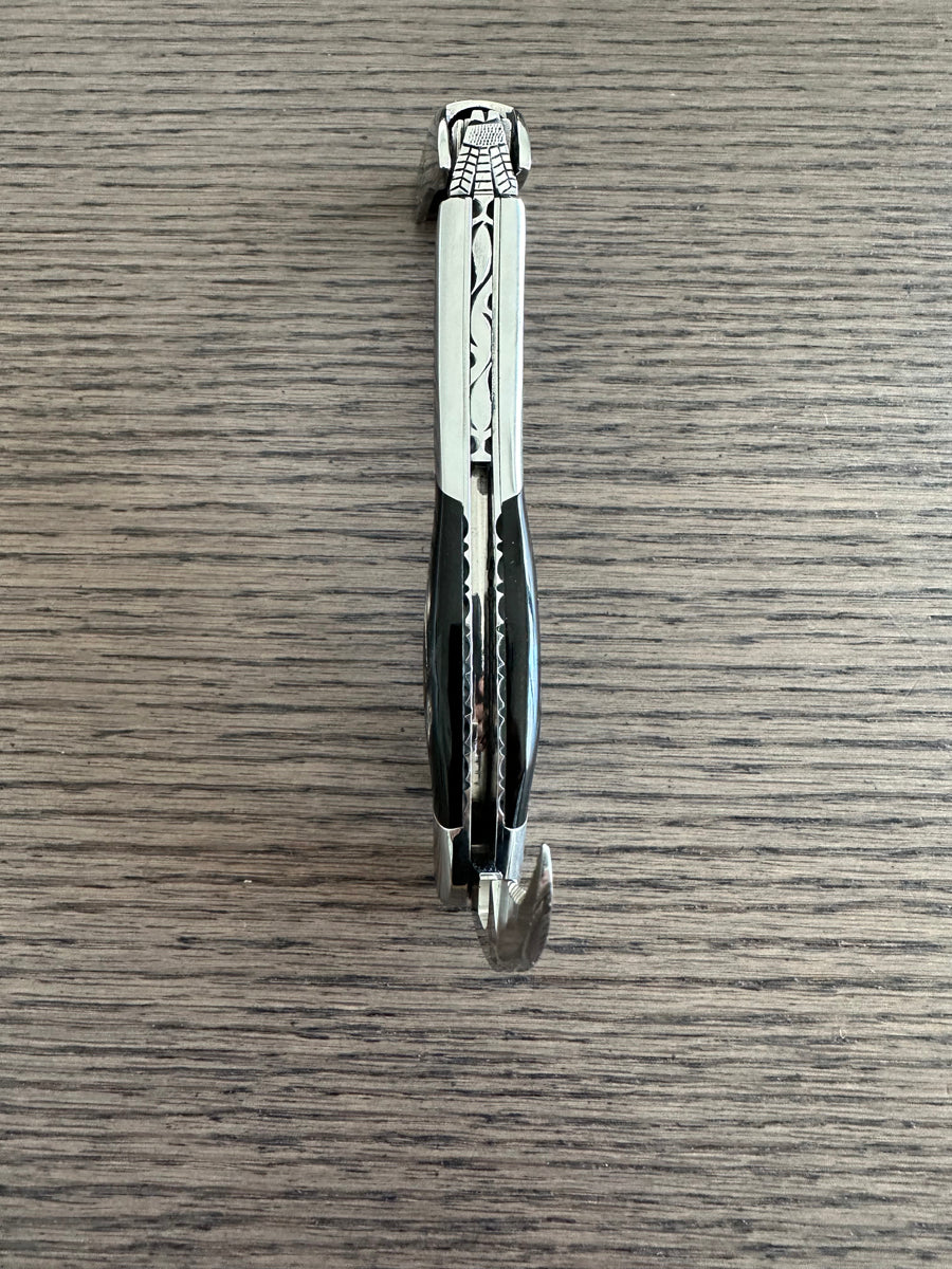 Folded corkscrew seen from above showing the carved spine