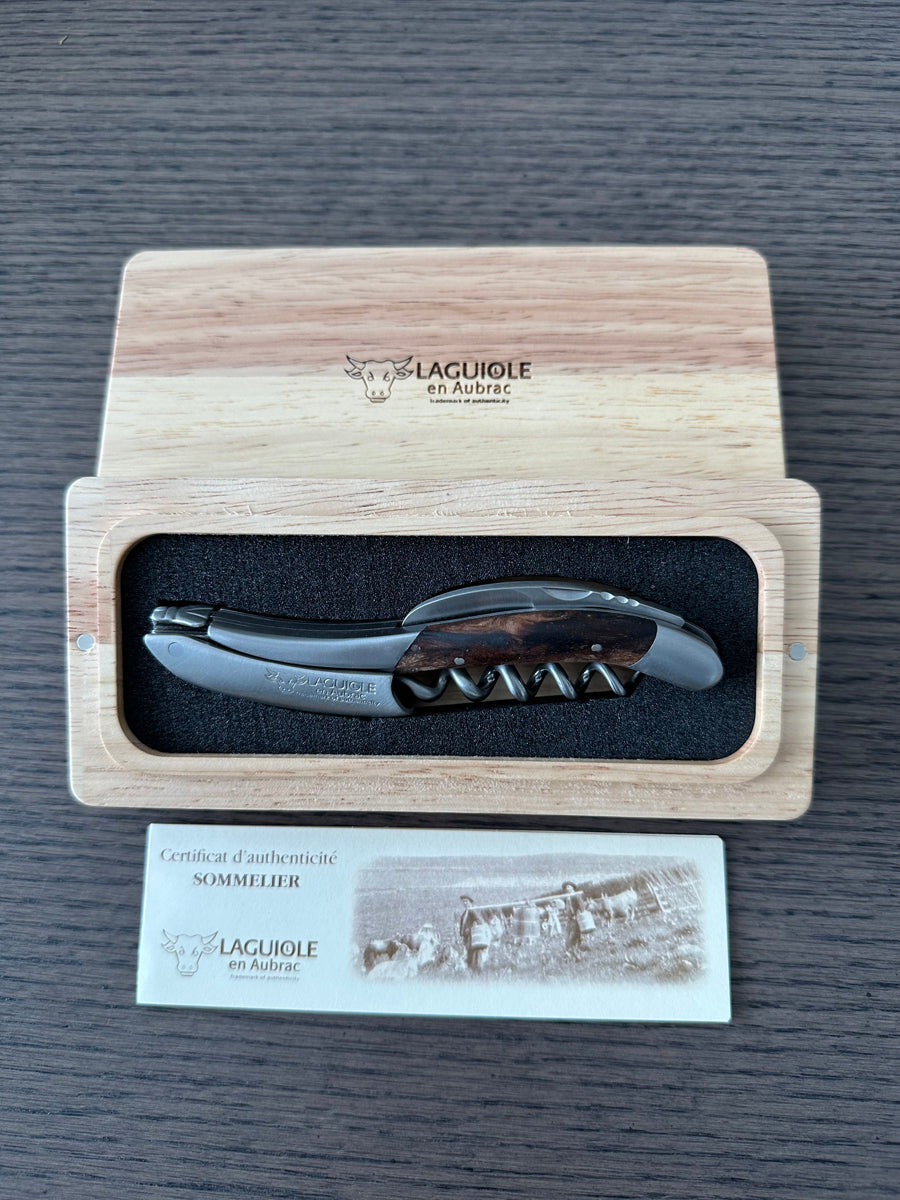 Boxed corkscrew with the Laguiole en Aubrac certificate below