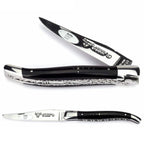 Black horn knife half open above a fully open view