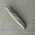 Closed knife showing the hand-filed double plates