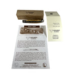 Knife with its wooden box, certificate and history booklet