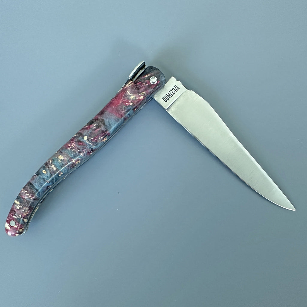 Knife half open with the blade pointing right