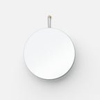 Lure Round mirror in a hallway