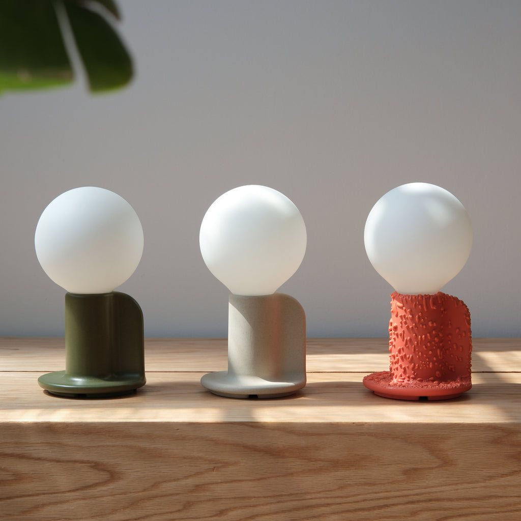 Q Table Lamp scale on a nightstand