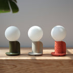 Q Table Lamp scale on a nightstand