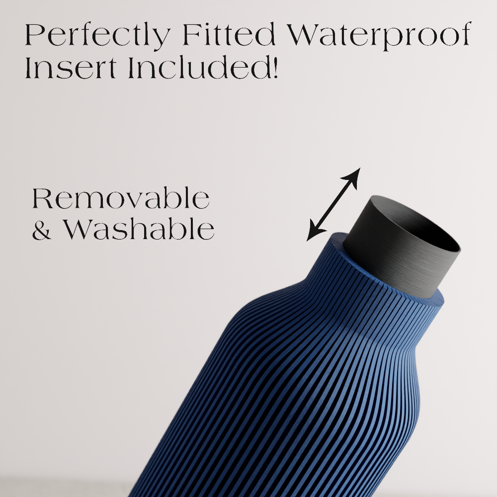 Ribbed Bottle Vase in navy blue showing vertical rib texture