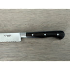 Close view of the triple rivet ebony handle and bolster
