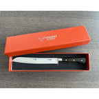 Ebony bread knife in an open orange Laguiole en Aubrac gift box
