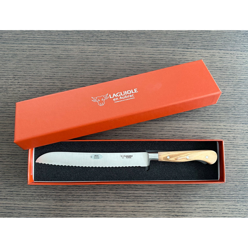 Bread knife in an open orange Laguiole en Aubrac gift box