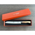 Bread knife in an open orange Laguiole en Aubrac gift box